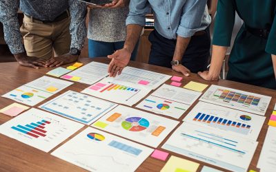 Business casual team working on graphs Corporate finance Services